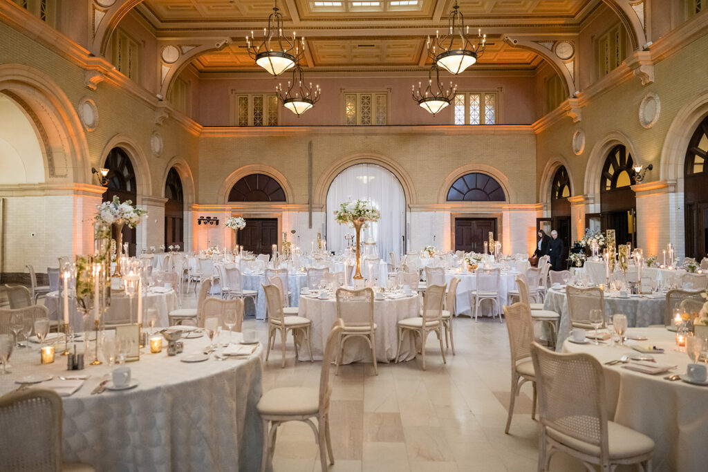 Elegant wedding reception setup at The Depot Minneapolis with florals by Reverie Floral and rentals by Linen Effects